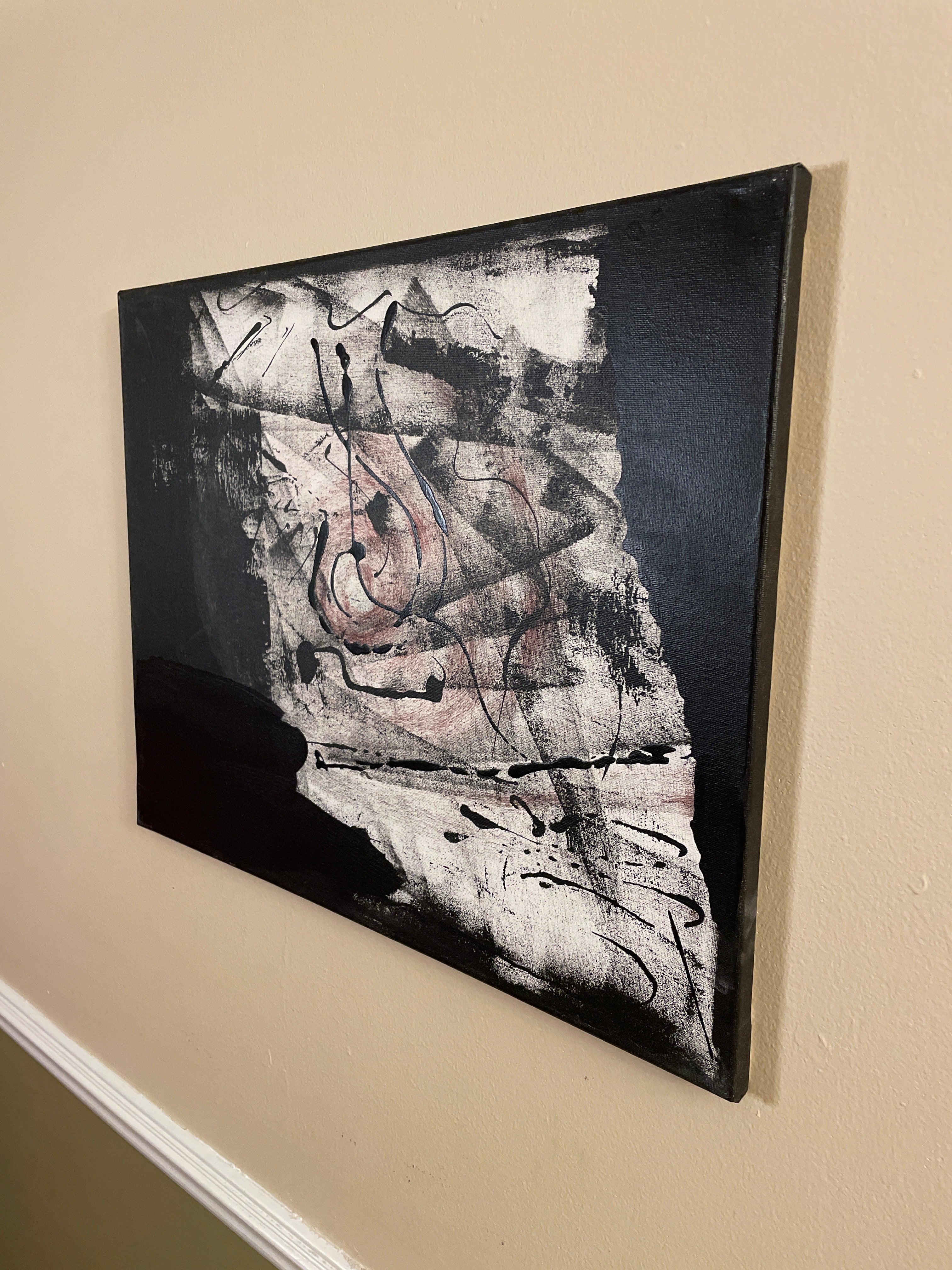 Black-and-white abstract painting on canvas with a distressed pale central field, faint blush tones, broad dark edges and fluid black lines suggesting a fragmented face, body or handwritten notation.